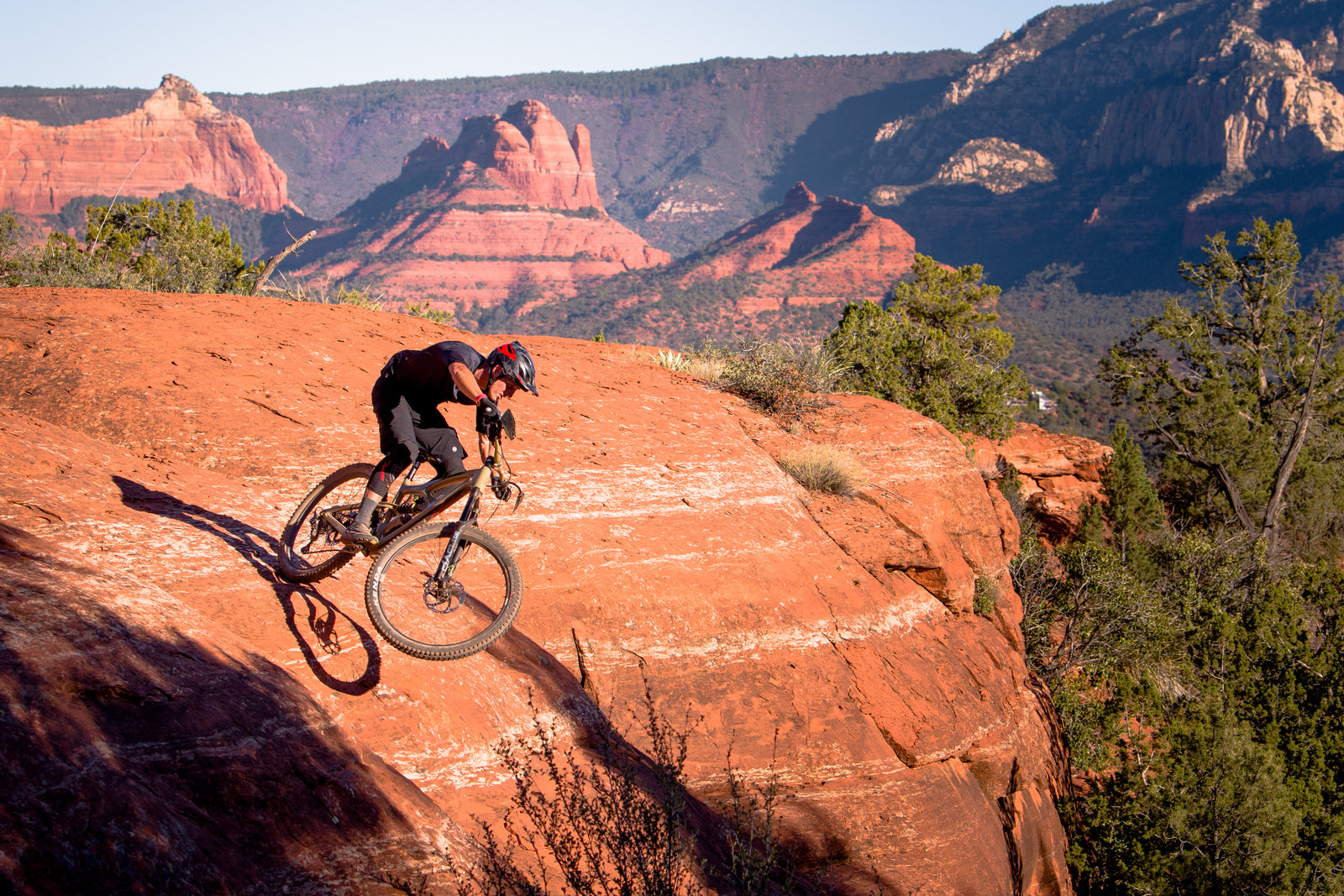 Brian Lopes riding Sedona red rock on E-MTB with KENDA Tires