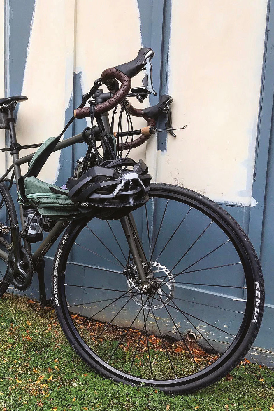 KENDA Tires mounted on a touring bike with pack and fishing rod